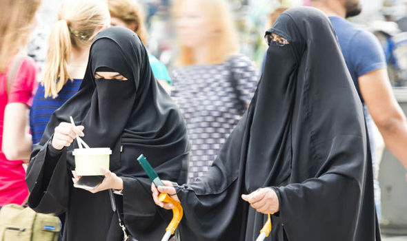 germanyslargeststatetobanislamicfaceveilasministerthinksithinderscommunication